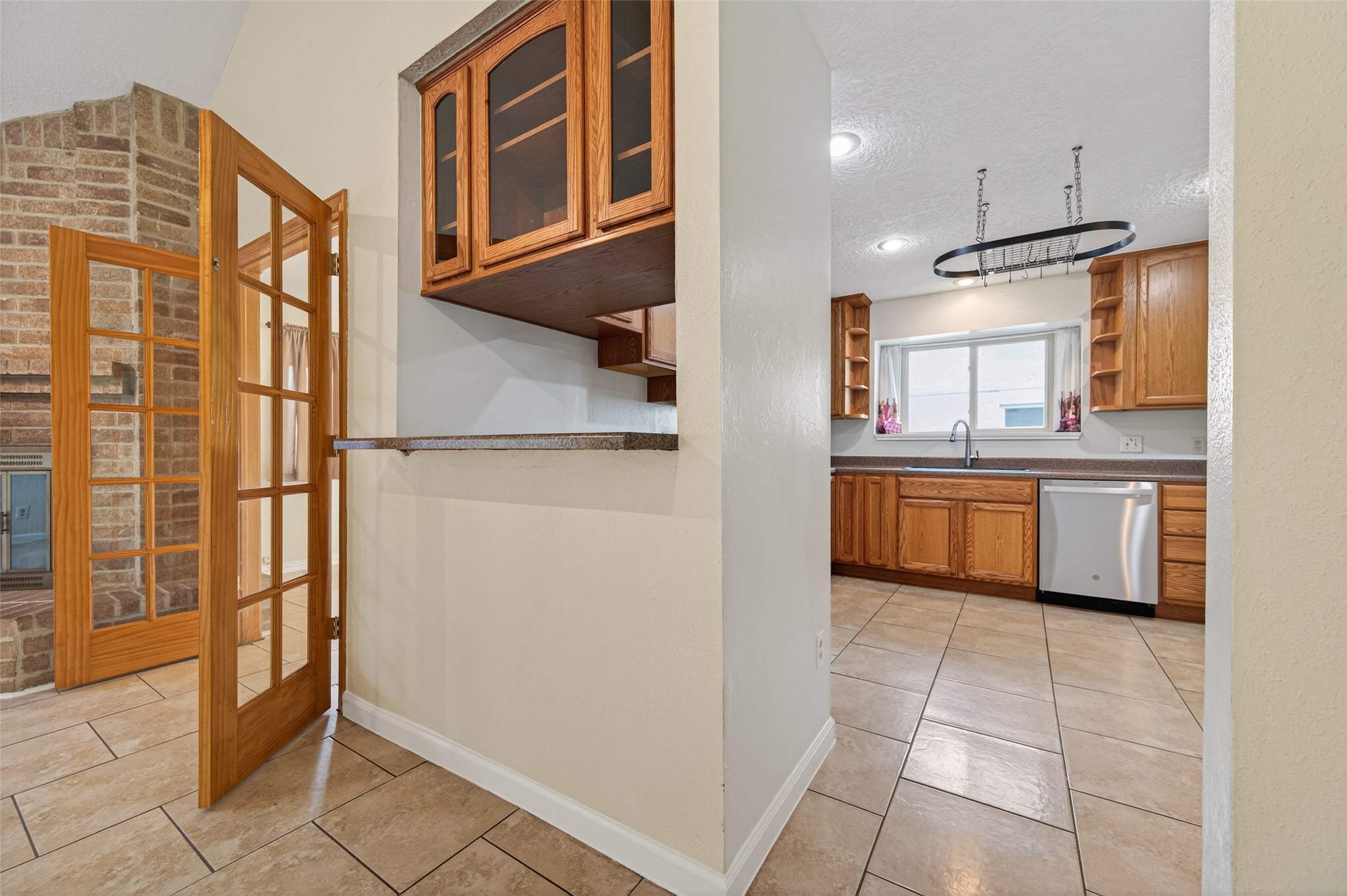 21315 Meadowhill Drive Spring, TX 77388 - Photo 8 of 31 a view of a kitchen with a refrigerator and a sink