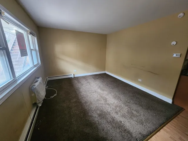 en empty room with windows