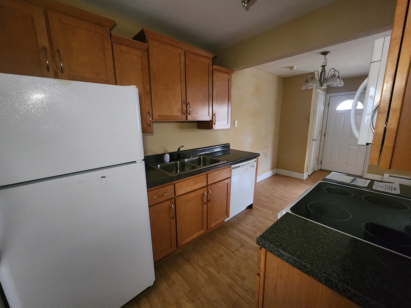 4215 South Harlem Avenue, Unit 3 Stickney, IL 60402 - Photo 7 of 10 a kitchen with a refrigerator and a stove