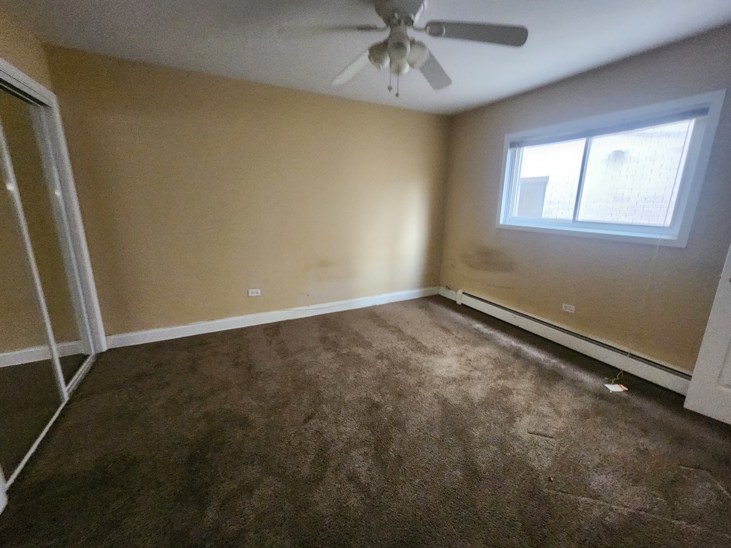 4215 South Harlem Avenue, Unit 3 Stickney, IL 60402 - Photo 9 of 10 an empty room with a window