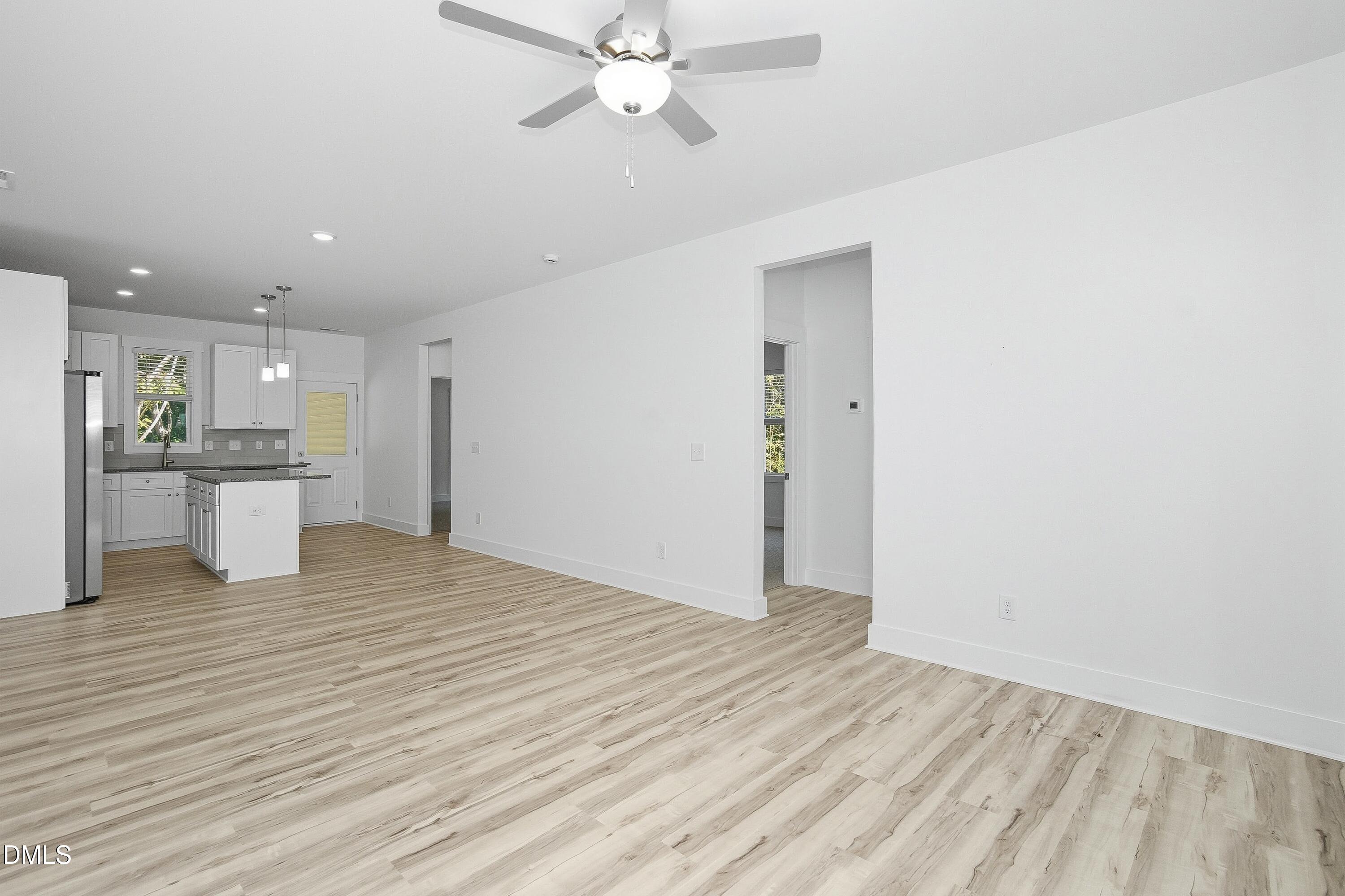 97 Gates Street Roxboro, NC 27573 - Photo 15 of 34 a view of kitchen with refrigerator and window