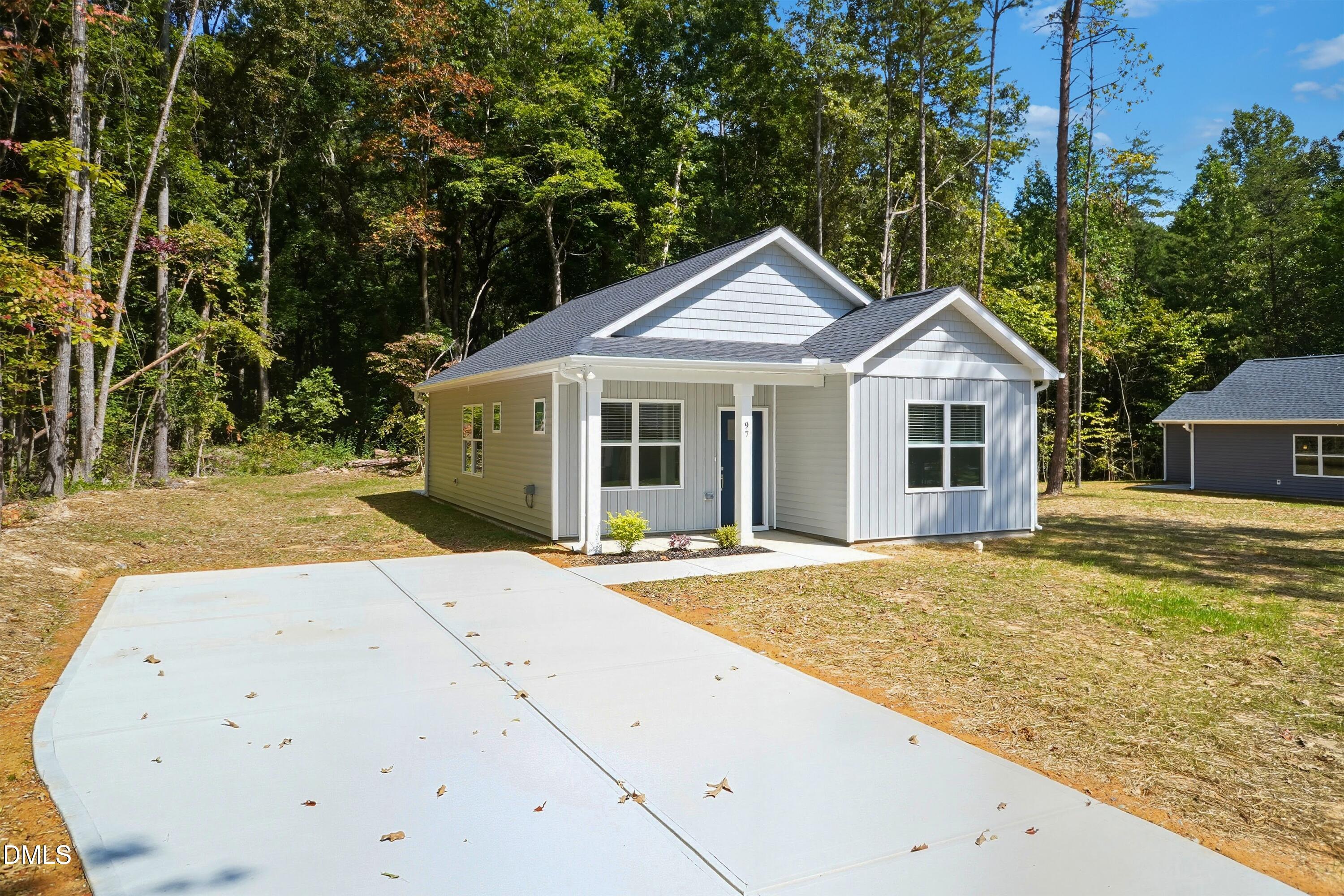 97 Gates Street Roxboro, NC 27573 - Photo 2 of 34 a view of house with yard