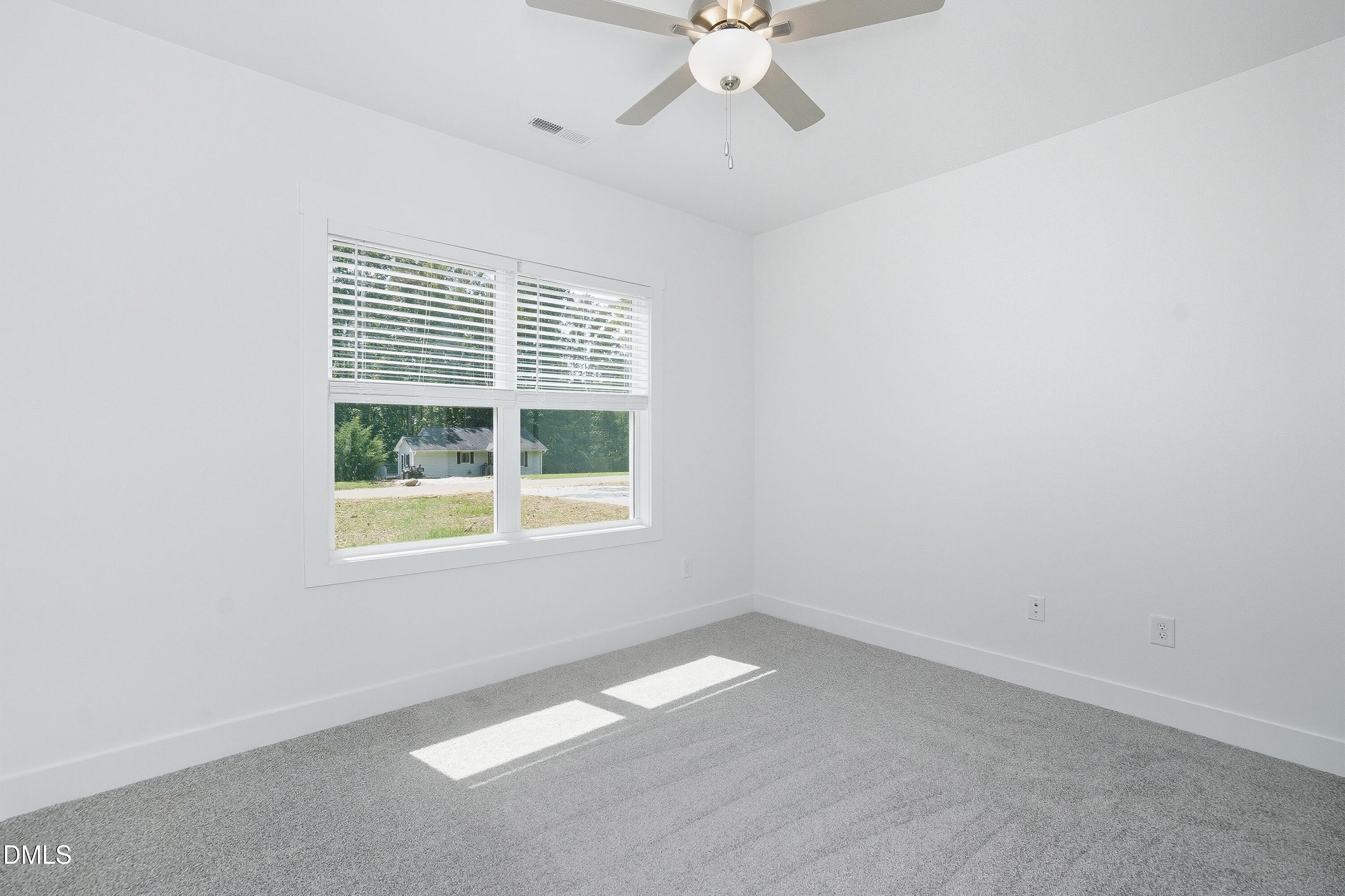 97 Gates Street Roxboro, NC 27573 - Photo 23 of 34 an empty room with a window