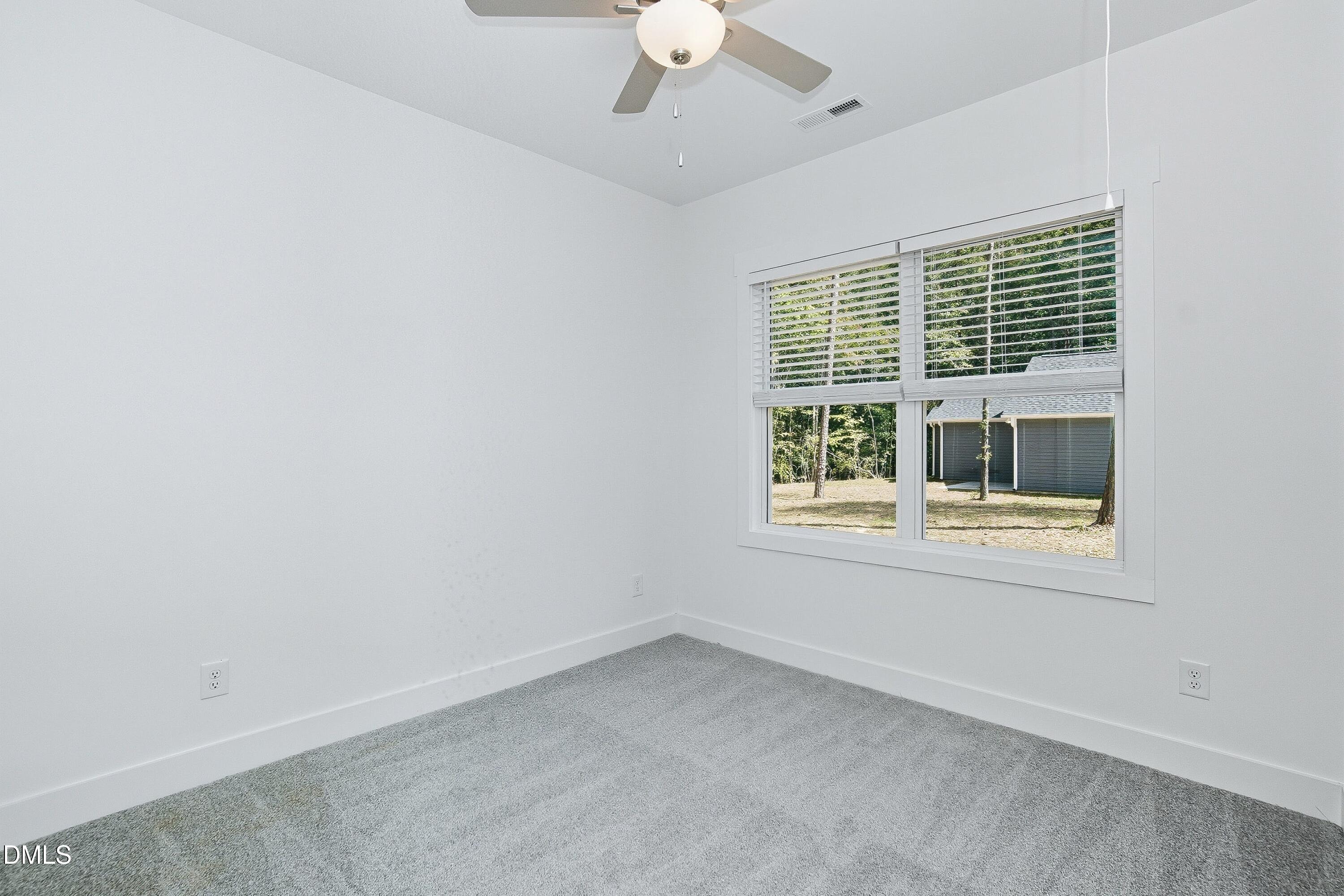 97 Gates Street Roxboro, NC 27573 - Photo 24 of 34 an empty room with a window