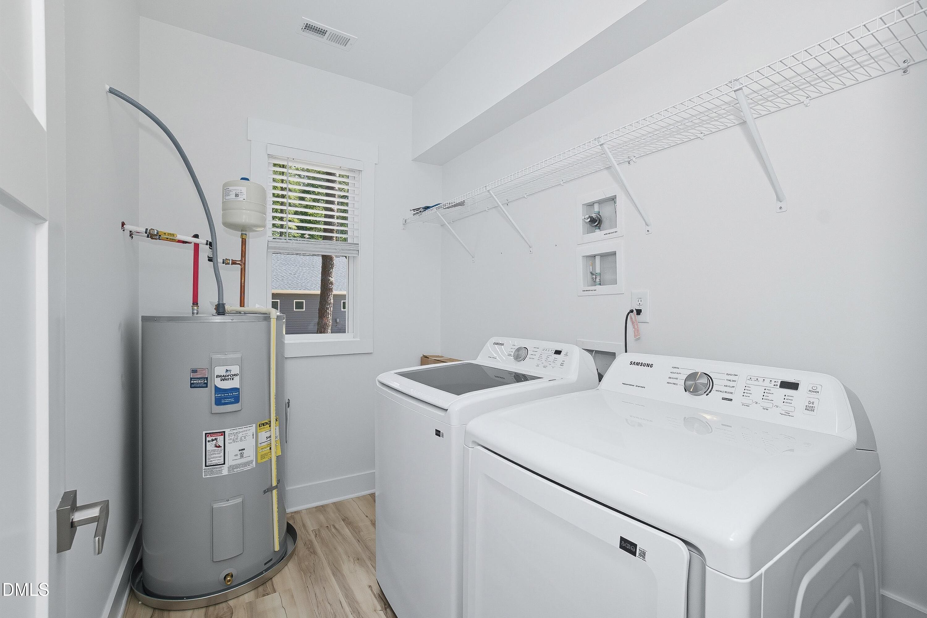 97 Gates Street Roxboro, NC 27573 - Photo 26 of 34 a utility room with dryer and washer