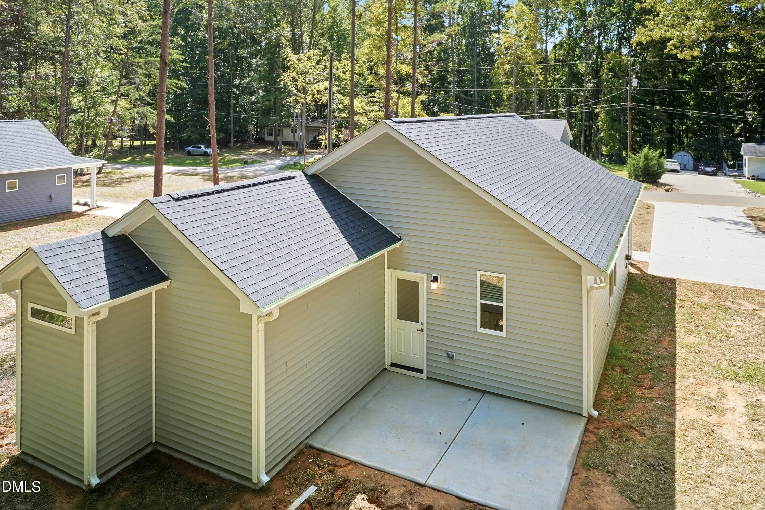 97 Gates Street Roxboro, NC 27573 - Photo 28 of 34 a view of a house with a yard
