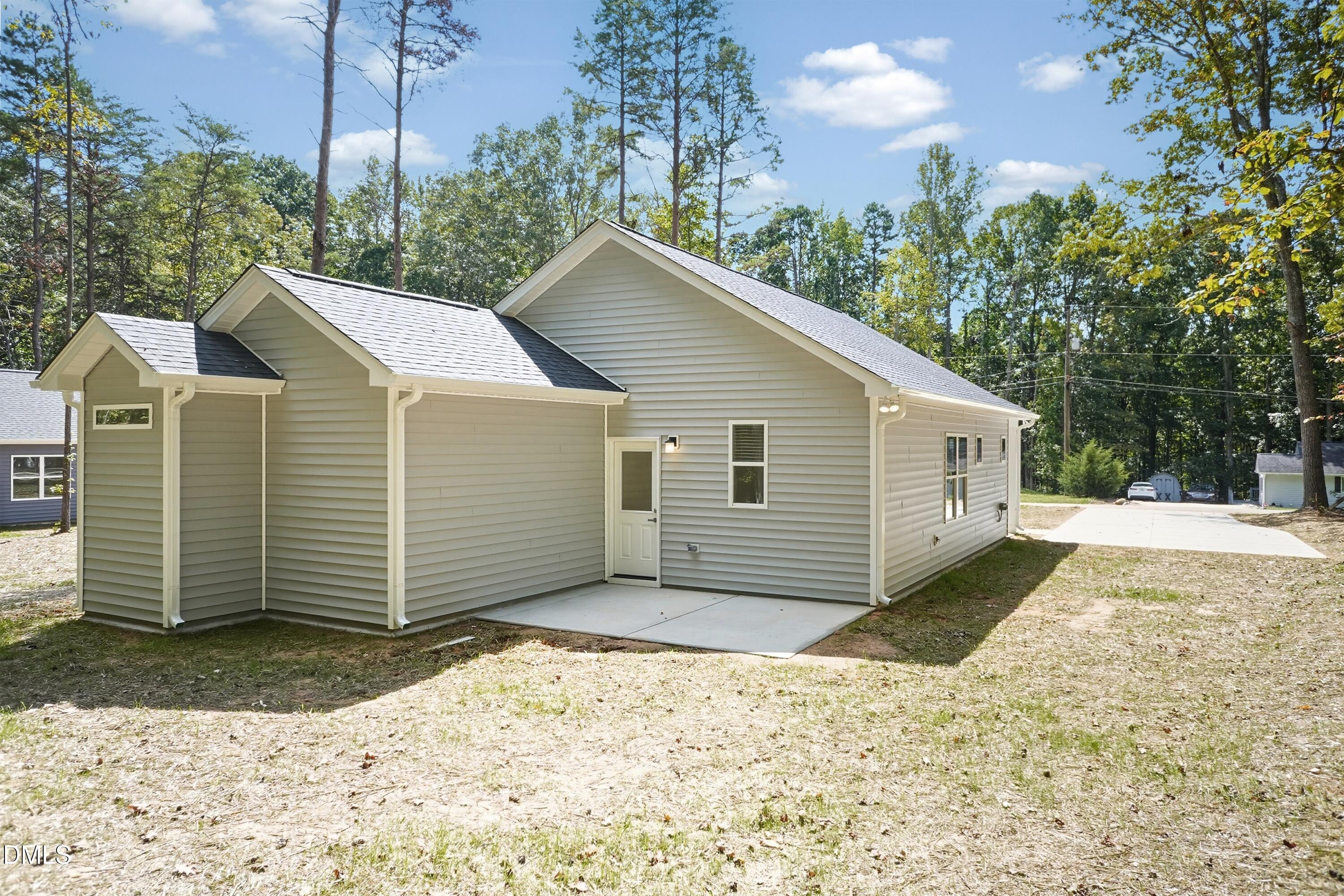 97 Gates Street Roxboro, NC 27573 - Photo 31 of 34 a view of a house with a yard