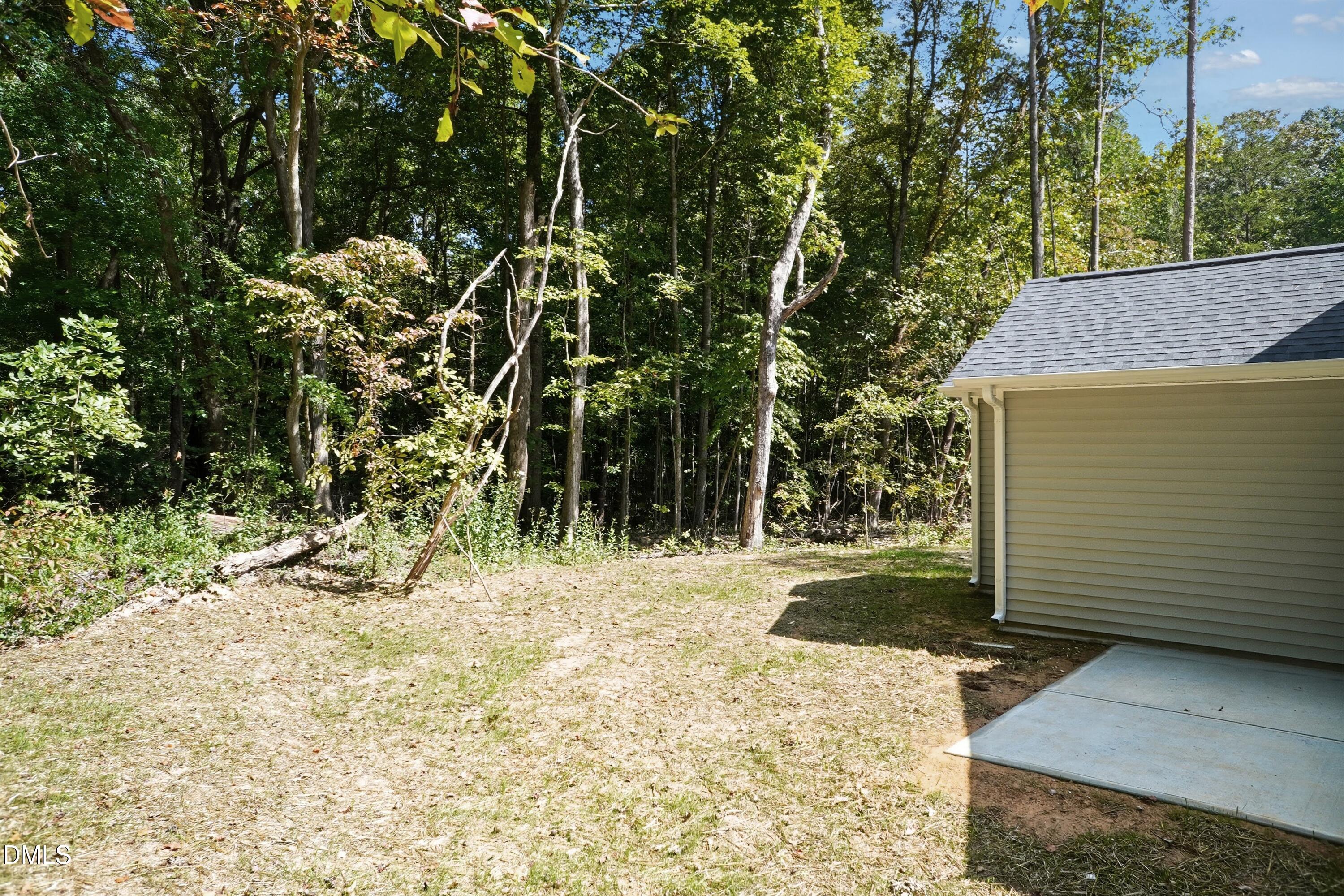 97 Gates Street Roxboro, NC 27573 - Photo 32 of 34 a view of a backyard of the house