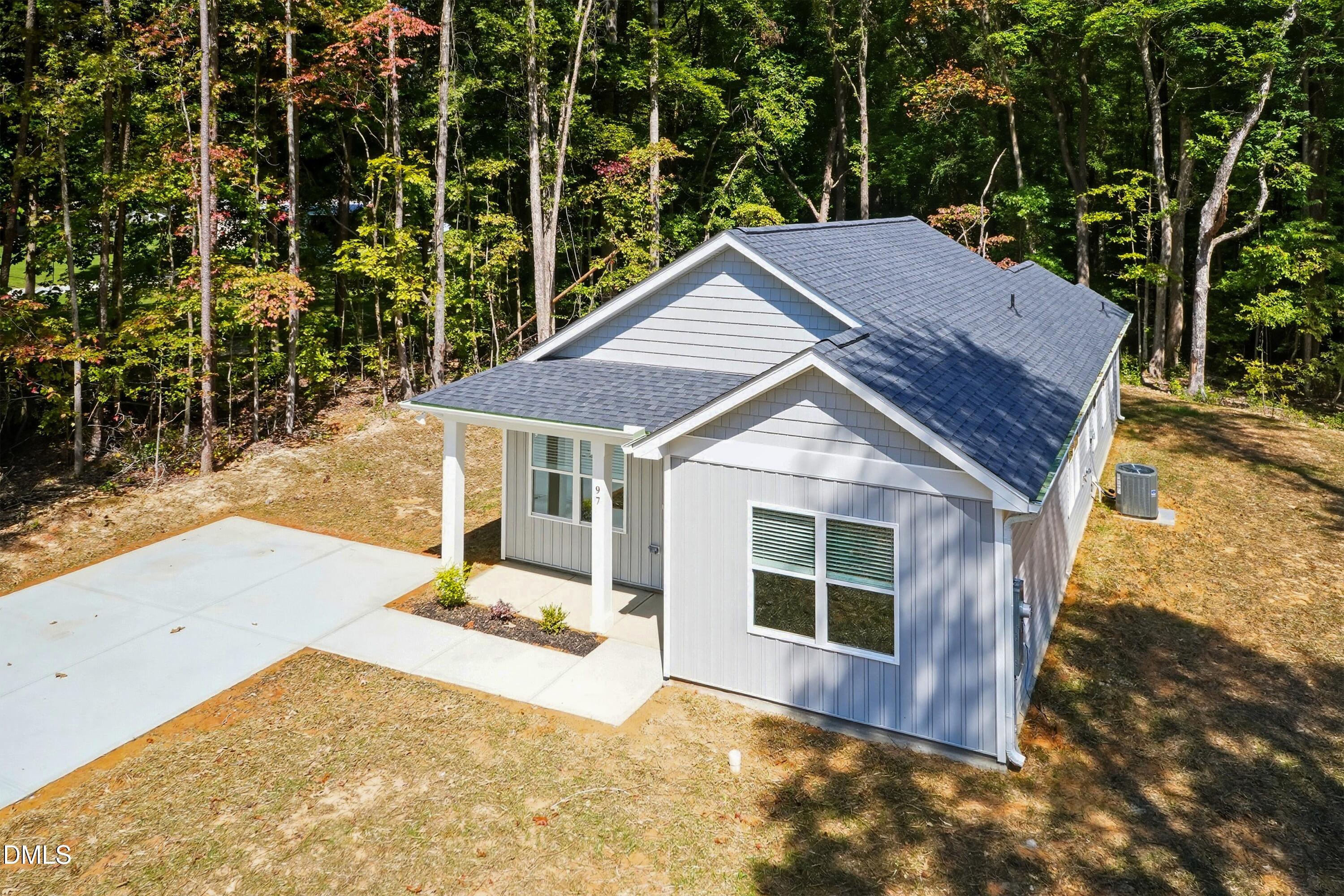 97 Gates Street Roxboro, NC 27573 - Photo 33 of 34 front view of a house with a yard