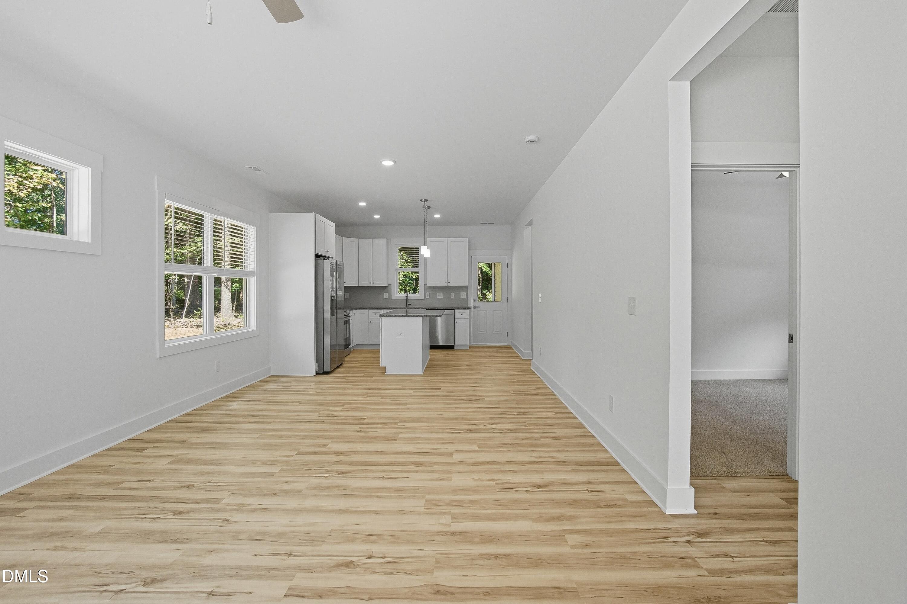 97 Gates Street Roxboro, NC 27573 - Photo 5 of 34 a view of kitchen with sink and refrigerator