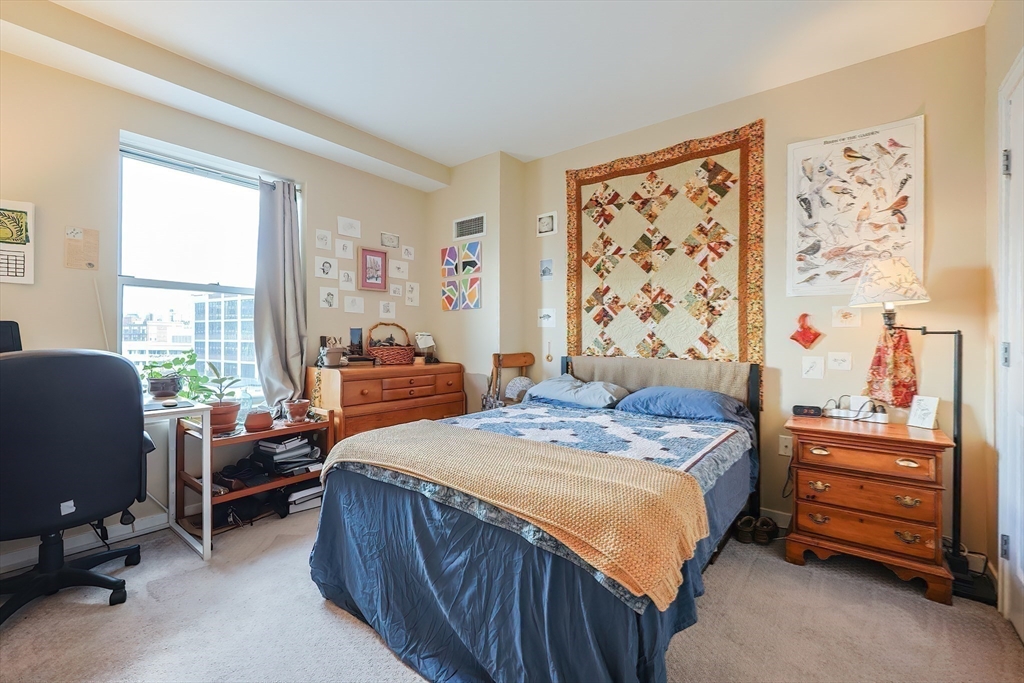16 Miner Street, Unit 501 Boston, MA 02215 - Photo 18 of 40 a bedroom with bed and a window