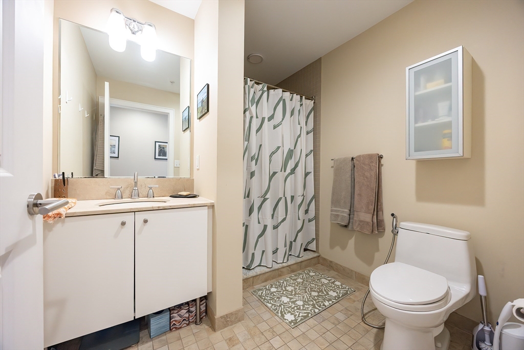 16 Miner Street, Unit 501 Boston, MA 02215 - Photo 22 of 40 a bathroom with a sink toilet and shower