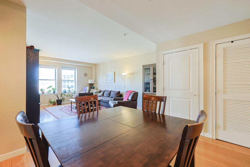 16 Miner Street, Unit 501 Boston, MA 02215 - Photo 7 of 40 a living room with furniture and wooden floor