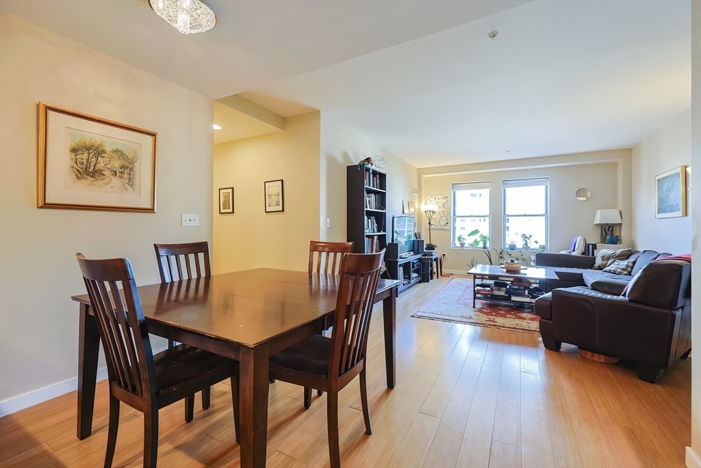 16 Miner Street, Unit 501 Boston, MA 02215 - Photo 8 of 40 a view of a dining room with furniture and wooden floor