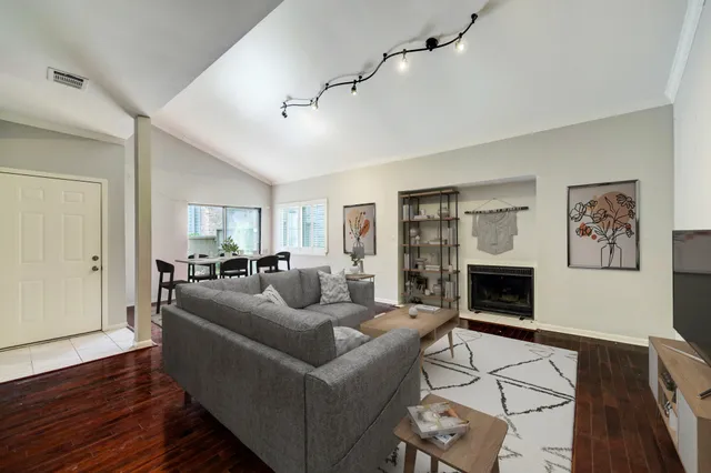 a living room with furniture or couch and a fireplace