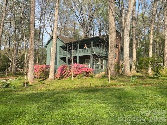 26 Fairway Ridge Lake Wylie, SC 29710 - Photo 1 of 48 a front view of a house with garden