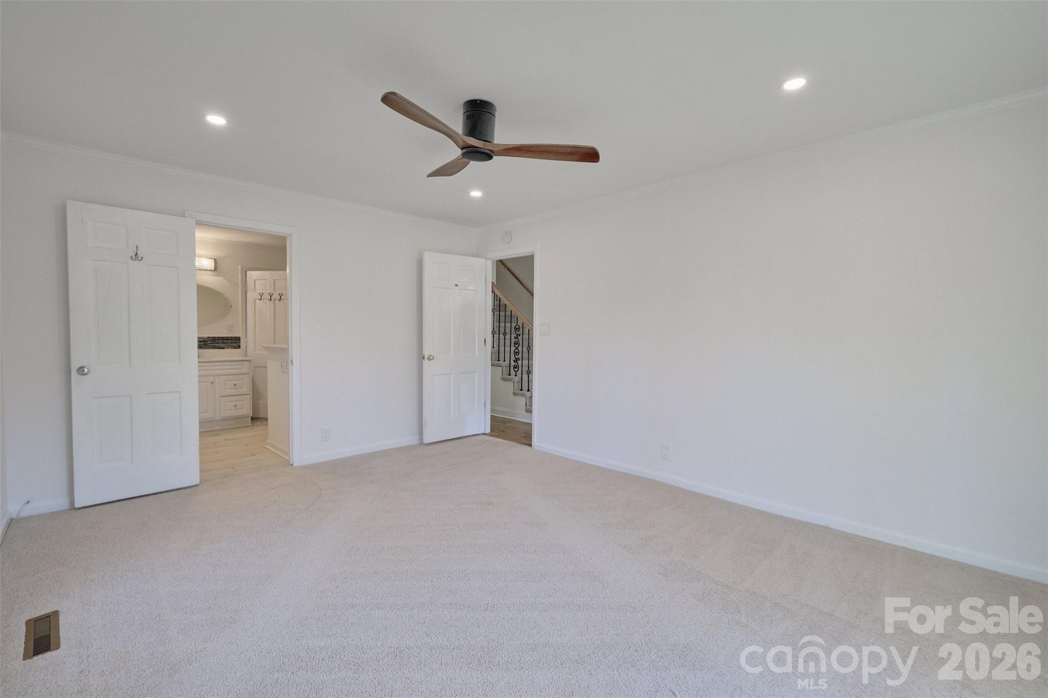 26 Fairway Ridge Lake Wylie, SC 29710 - Photo 19 of 48 an empty room with closet and a ceiling fan