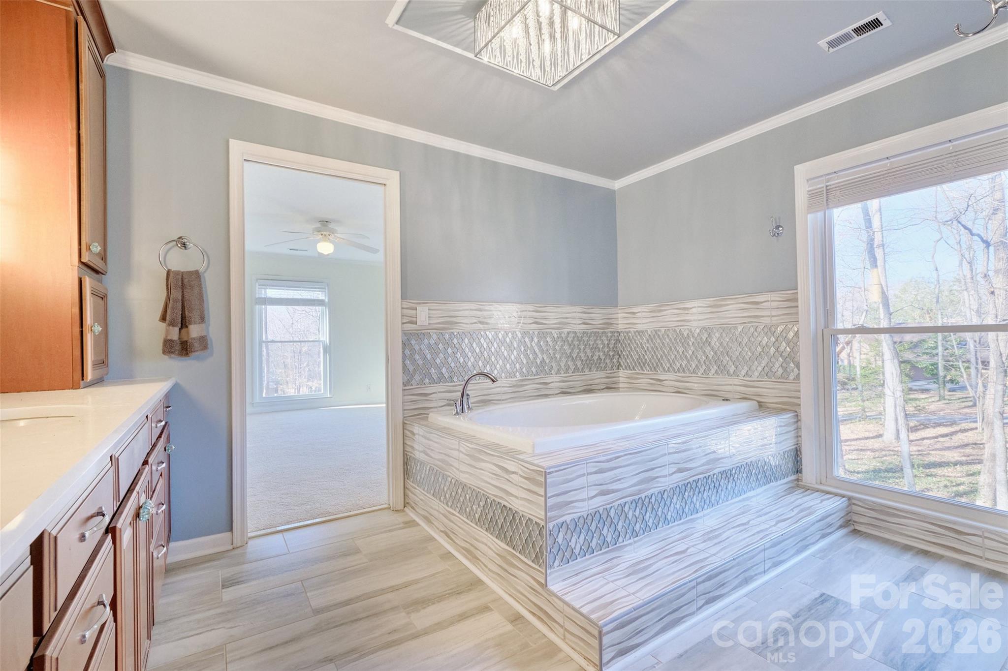 26 Fairway Ridge Lake Wylie, SC 29710 - Photo 22 of 48 a spacious bathroom with a tub shower and a sink