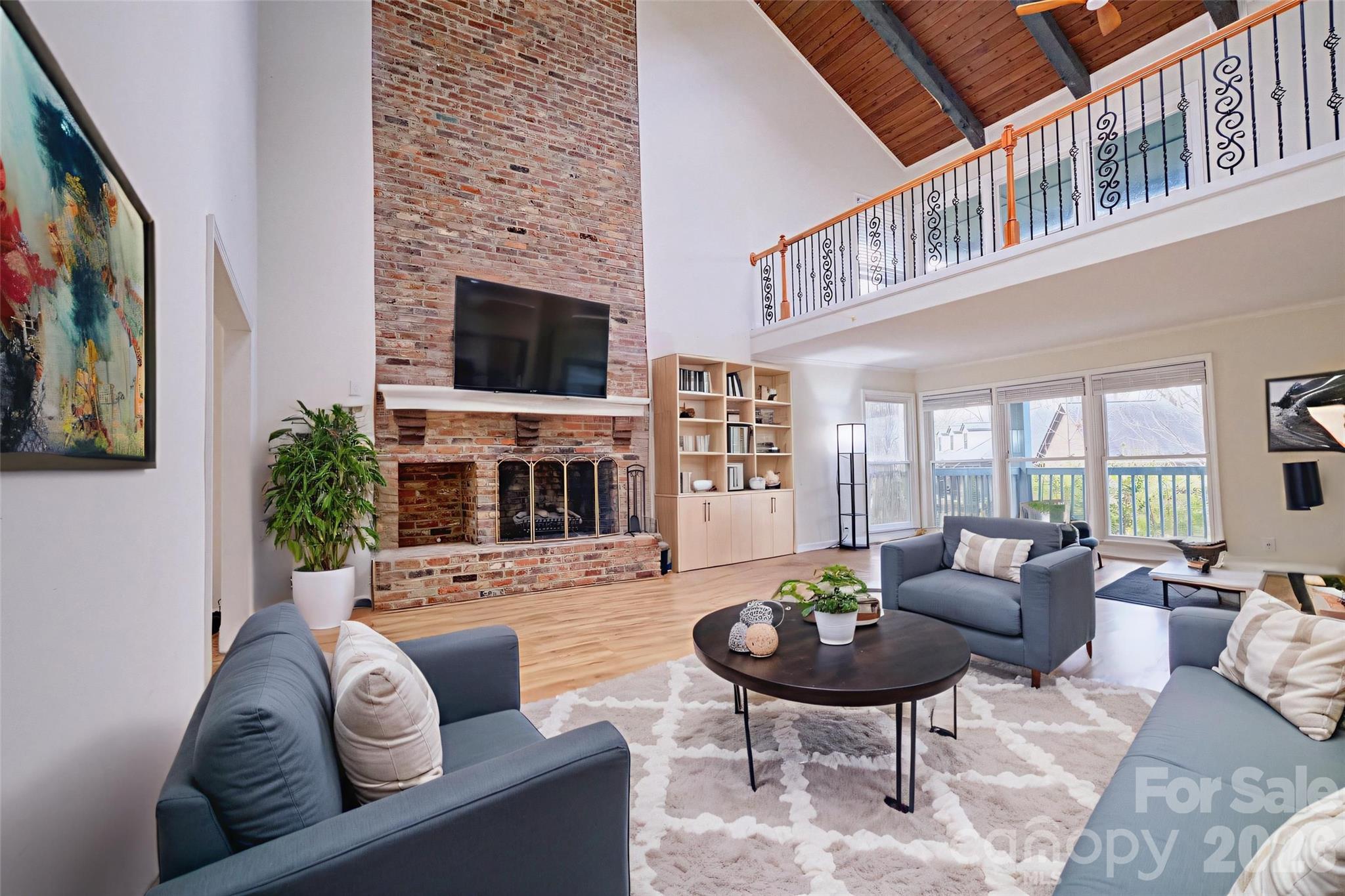 26 Fairway Ridge Lake Wylie, SC 29710 - Photo 7 of 48 a living room with furniture fireplace and a flat screen tv