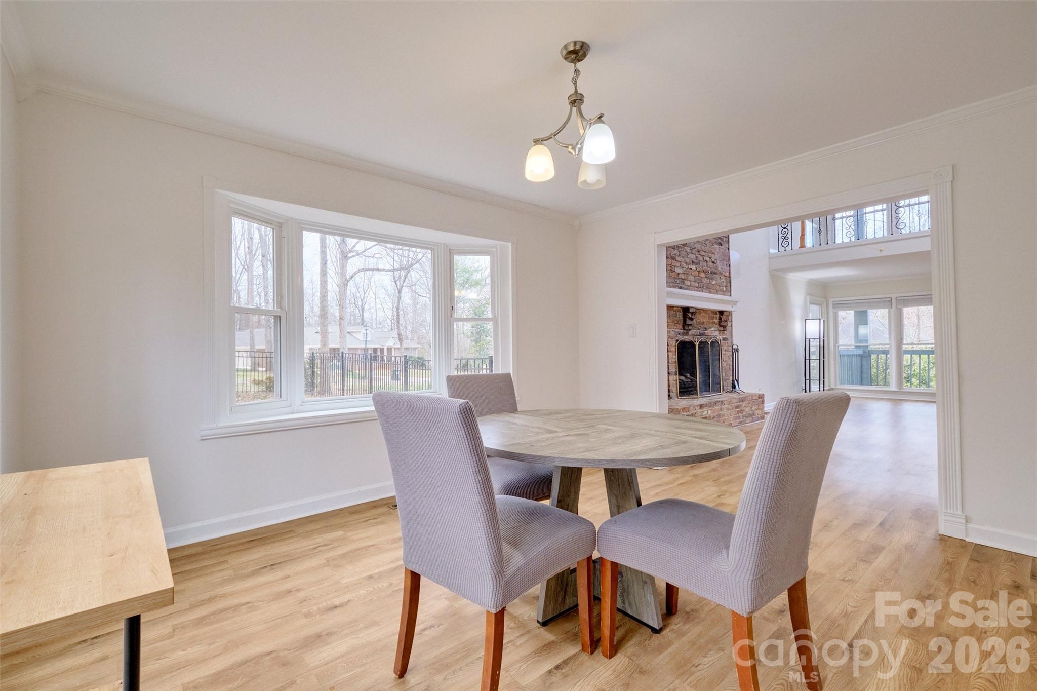 26 Fairway Ridge Lake Wylie, SC 29710 - Photo 8 of 48 a view of a dining room with furniture window and wooden floor