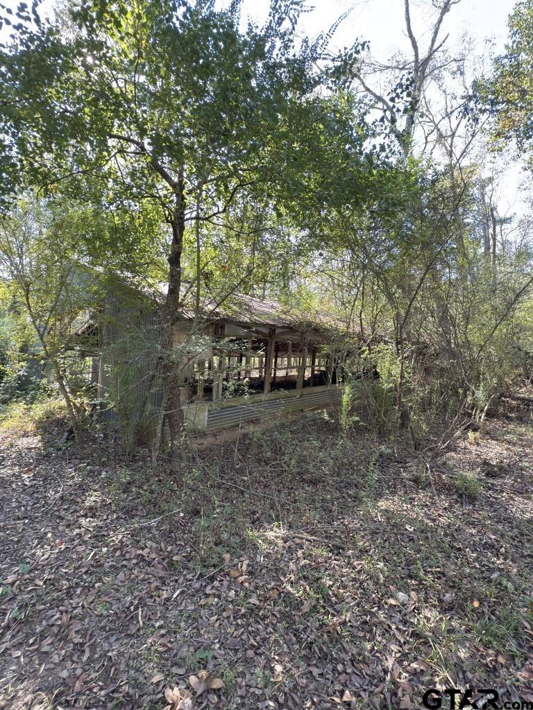 456 Marshall Ivy Road Huntington, TX 75949 - Photo 17 of 32 a view of house with yard and entertaining space