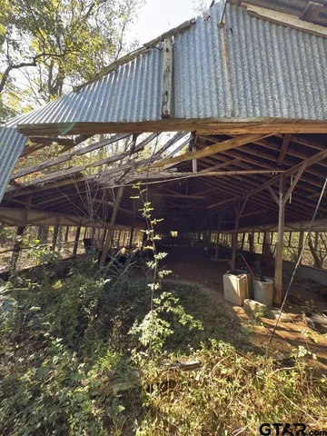 a view of a backyard of a house