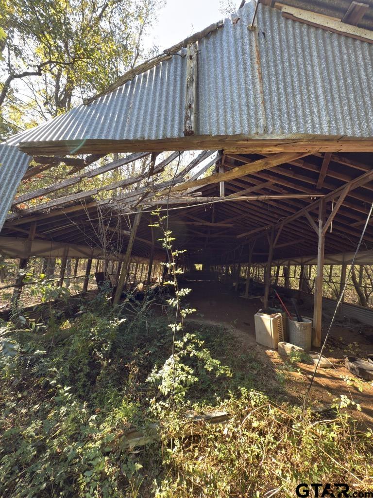 456 Marshall Ivy Road Huntington, TX 75949 - Photo 18 of 32 a view of a backyard of a house