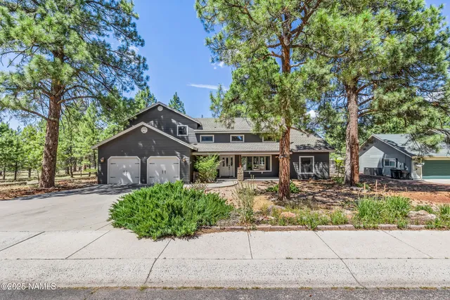 front view of a house with a small yard