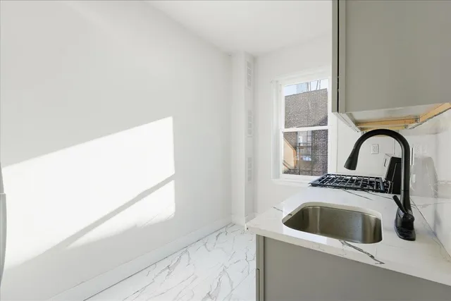 a close view of a sink and tap