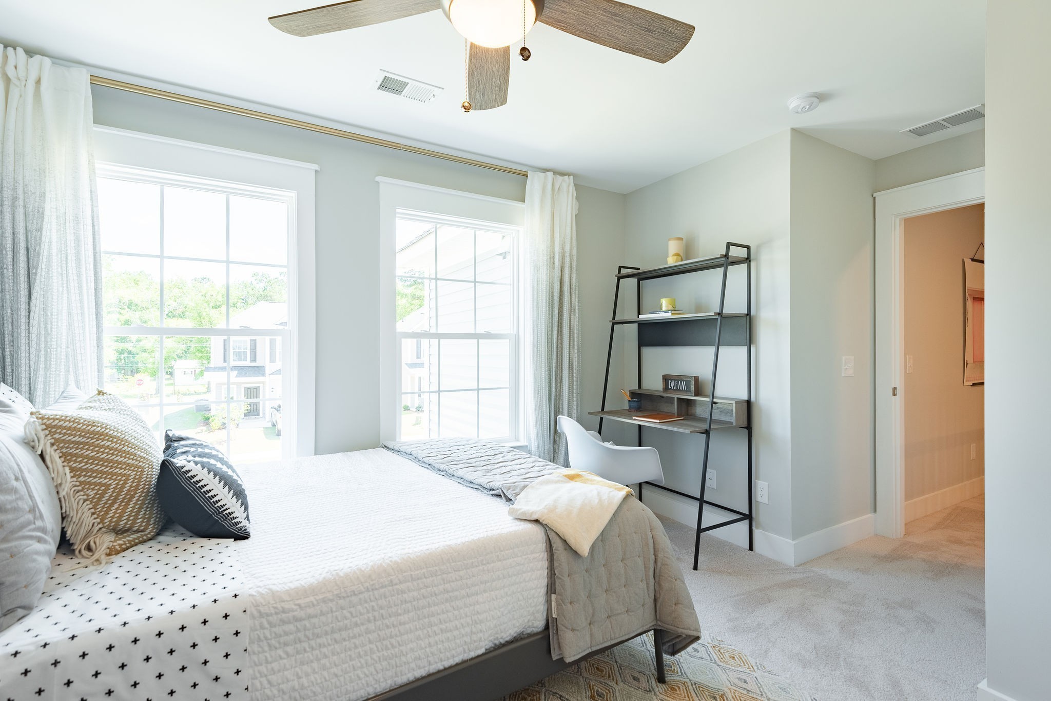 711 Conifer Drive Spring Hill, TN 37174 - Photo 13 of 19 a bedroom with a bed and a large window