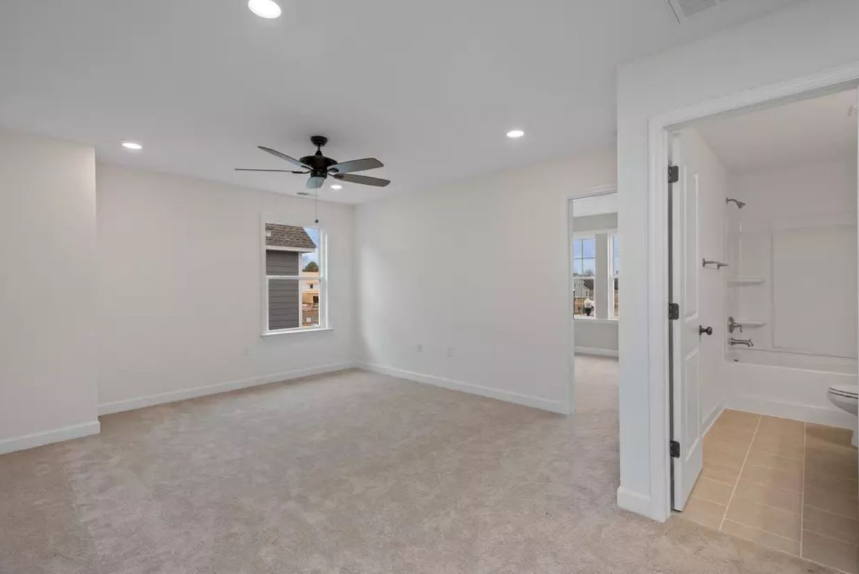 711 Conifer Drive Spring Hill, TN 37174 - Photo 17 of 19 a view of a livingroom with a chandelier fan