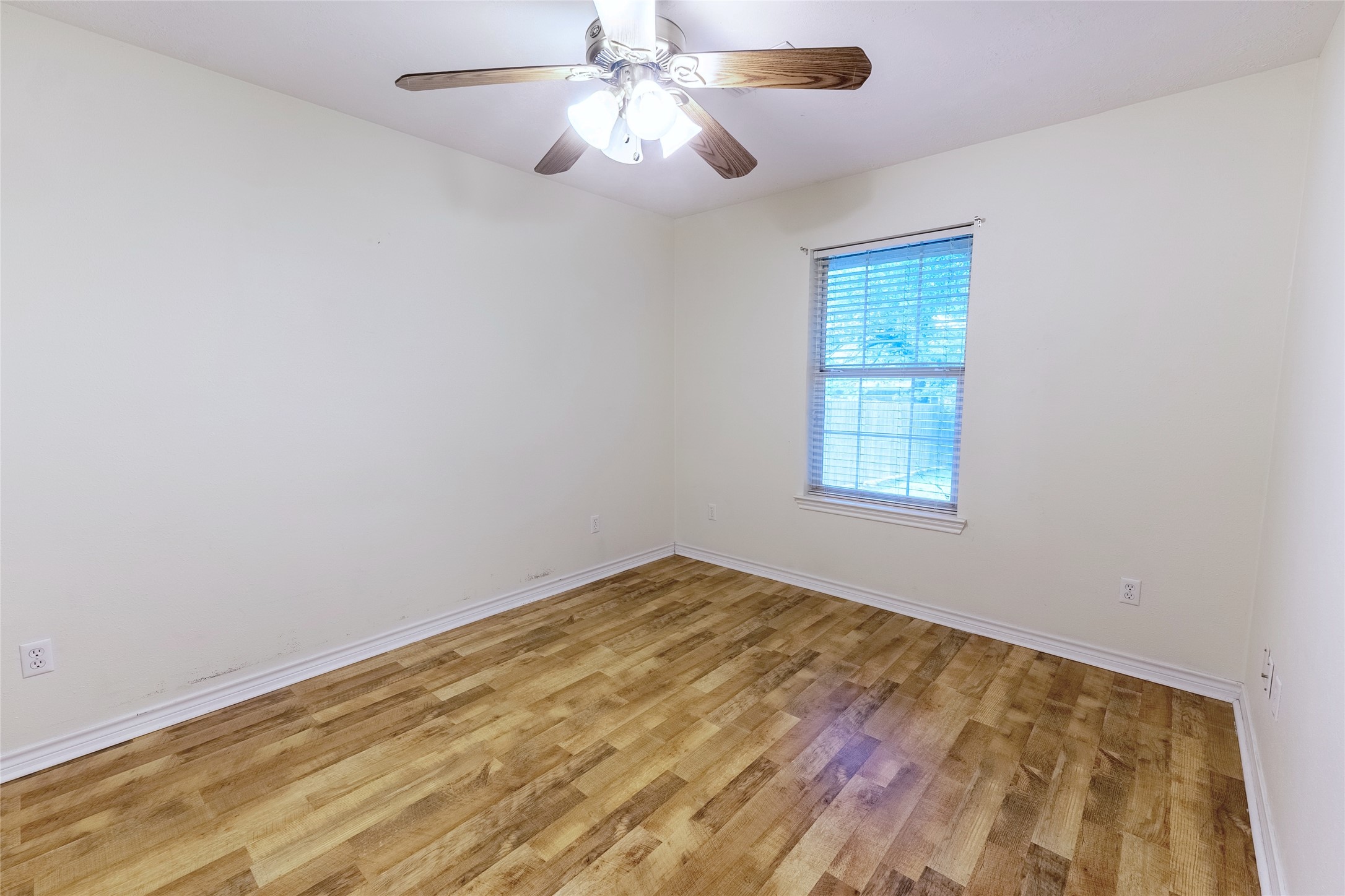 4802 Treadgold Lane Bryan, TX 77802 - Photo 19 of 27 a view of an empty room with a window