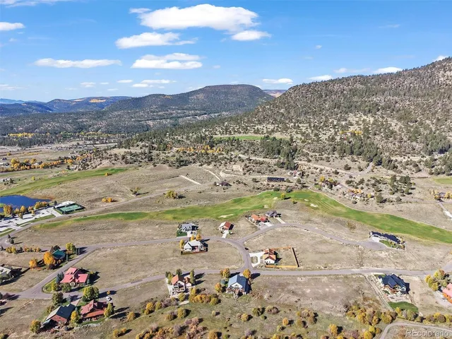 a view of a swimming pool with a mountain