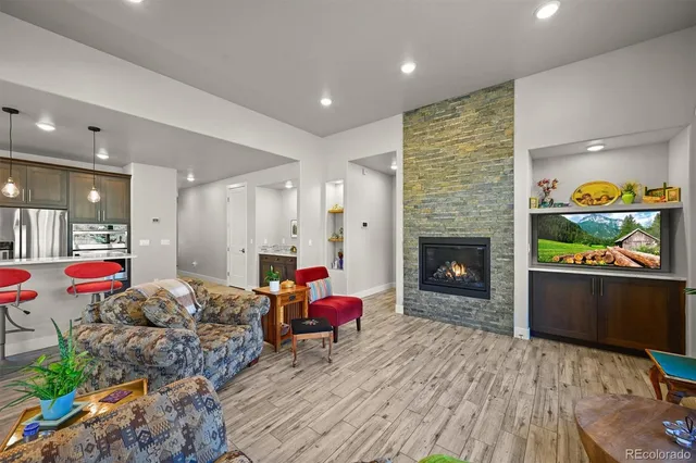 a living room with furniture and a window