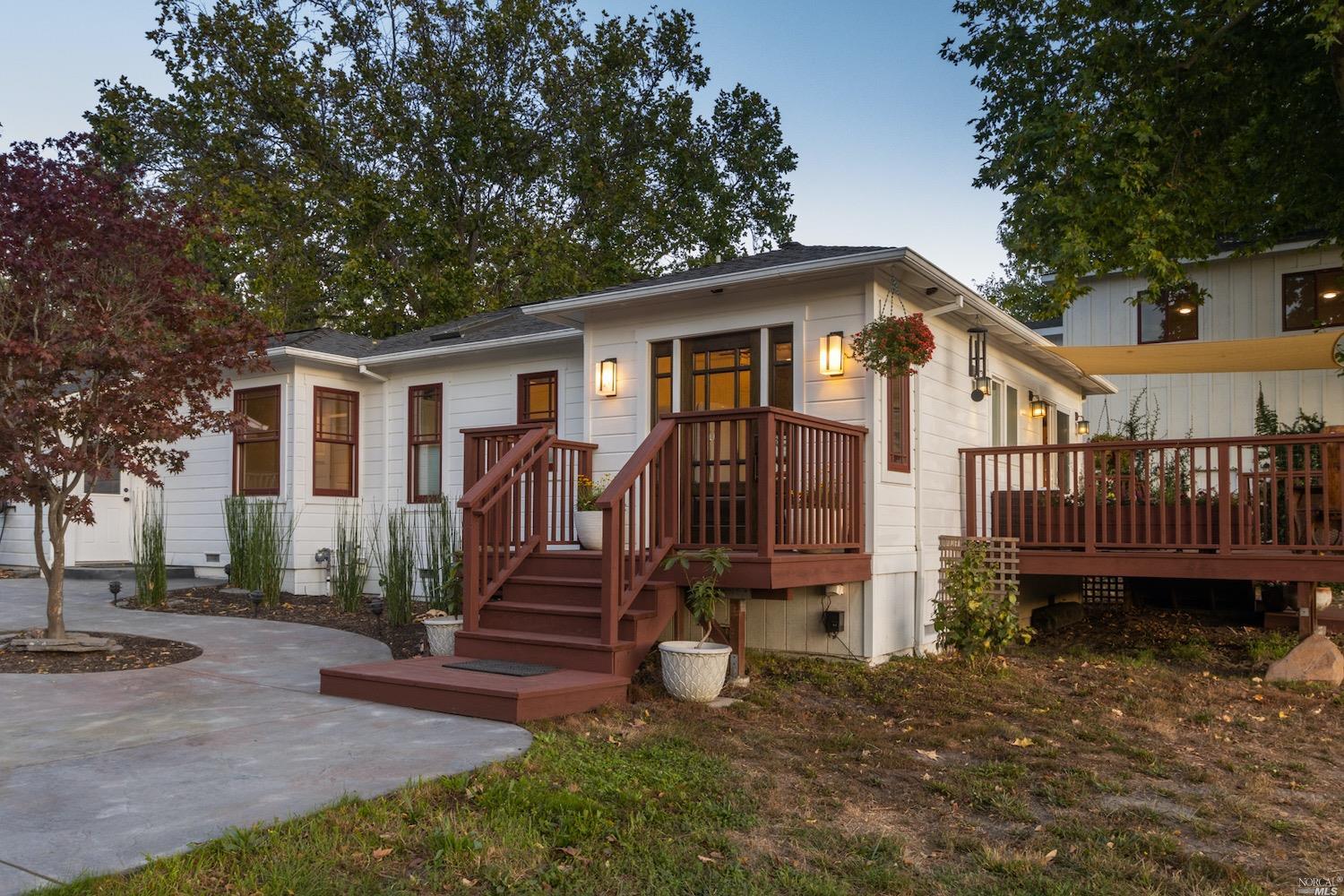 8910 Mill Station Road Sebastopol, CA 95472 - Photo 1 of 1 a view of a house with wooden deck front of house