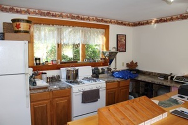 47 Goshen Road Williamsburg, MA 01096 - Photo 4 of 24 a kitchen that has a sink and a stove