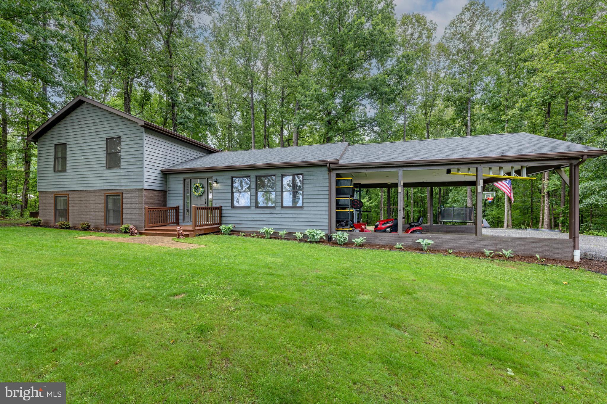 1425 Jacks Shop Road Rochelle, VA 22738 - Photo 42 of 56 a view of a house with a yard and sitting area