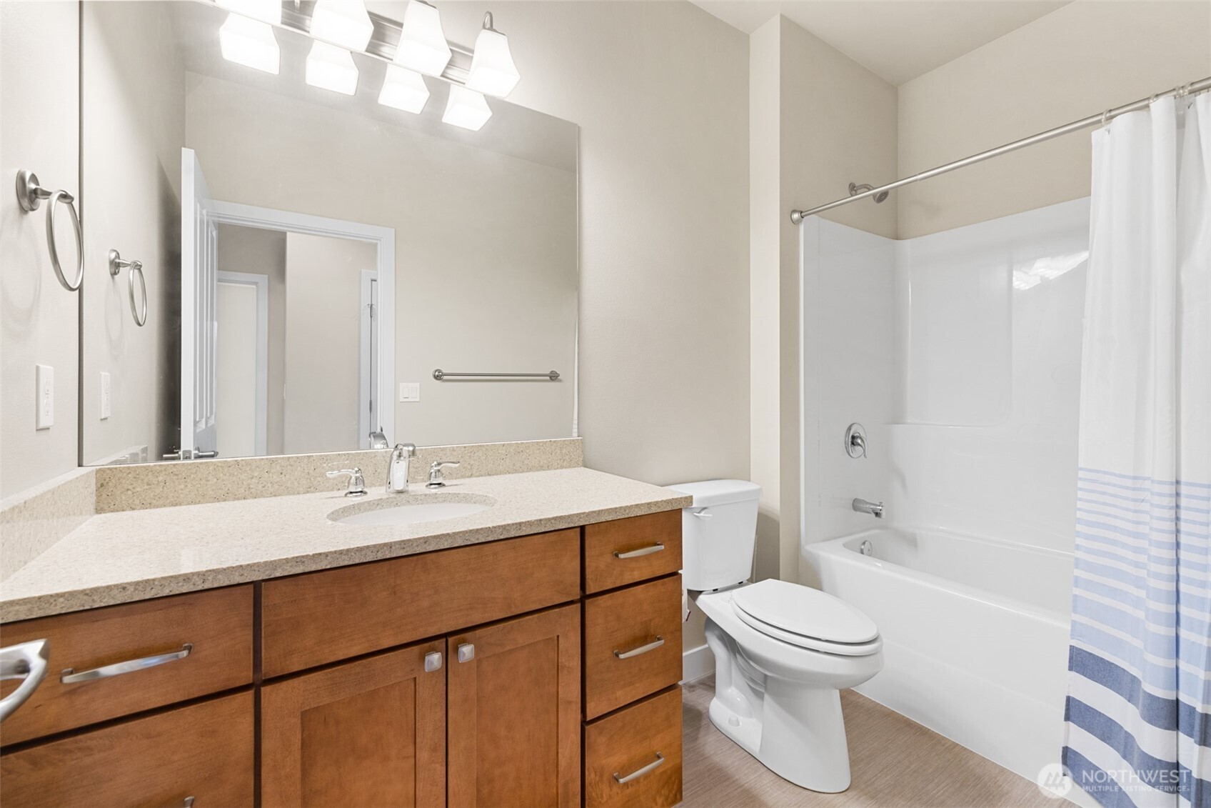440 Blue Glacier Loop Sequim, WA 98382 - Photo 13 of 34 a bathroom with a sink a toilet and shower