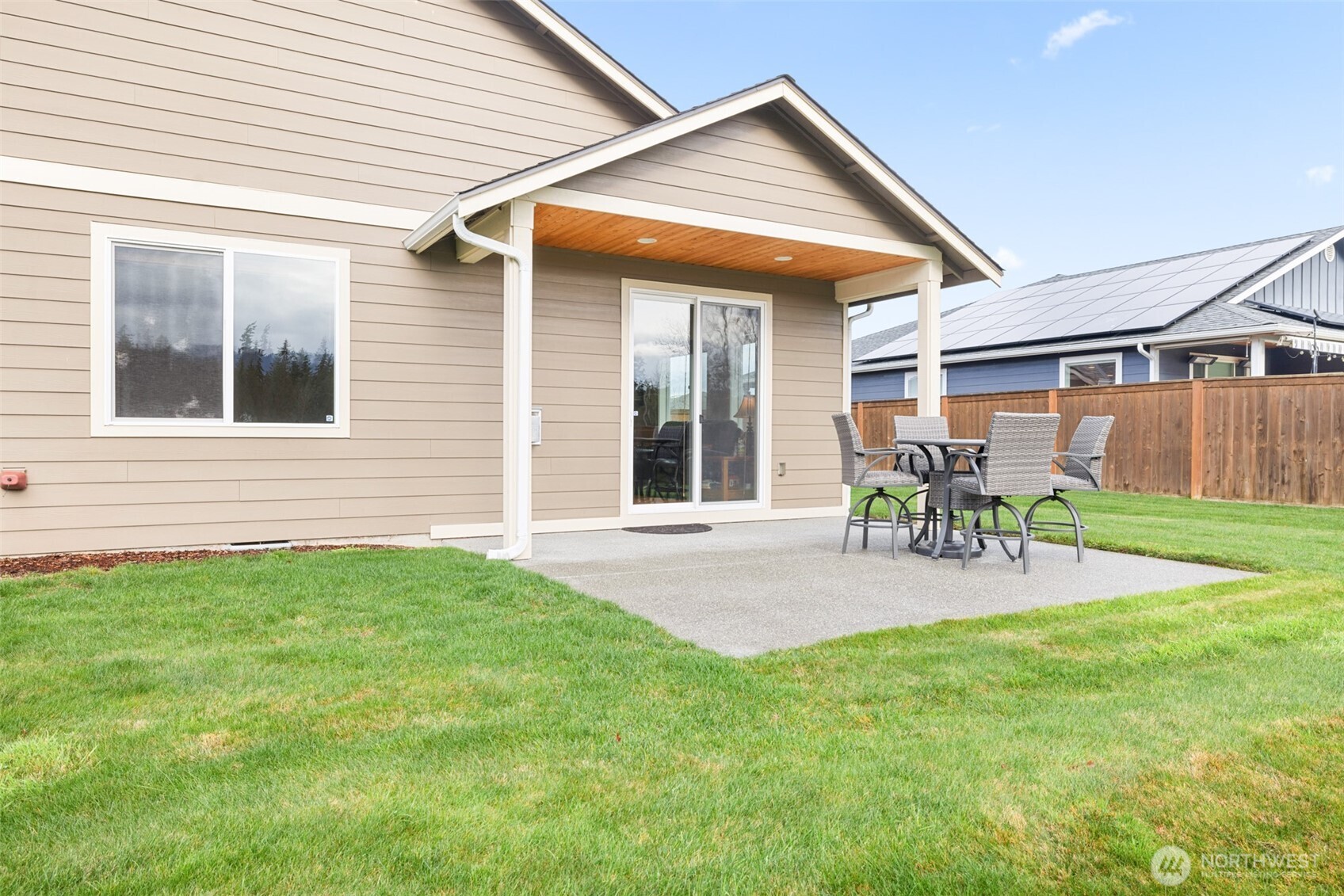 440 Blue Glacier Loop Sequim, WA 98382 - Photo 26 of 34 a patio with yard table and chairs