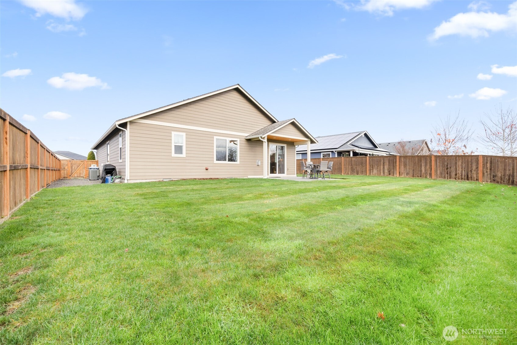 440 Blue Glacier Loop Sequim, WA 98382 - Photo 27 of 34 a view of a house with a yard and porch