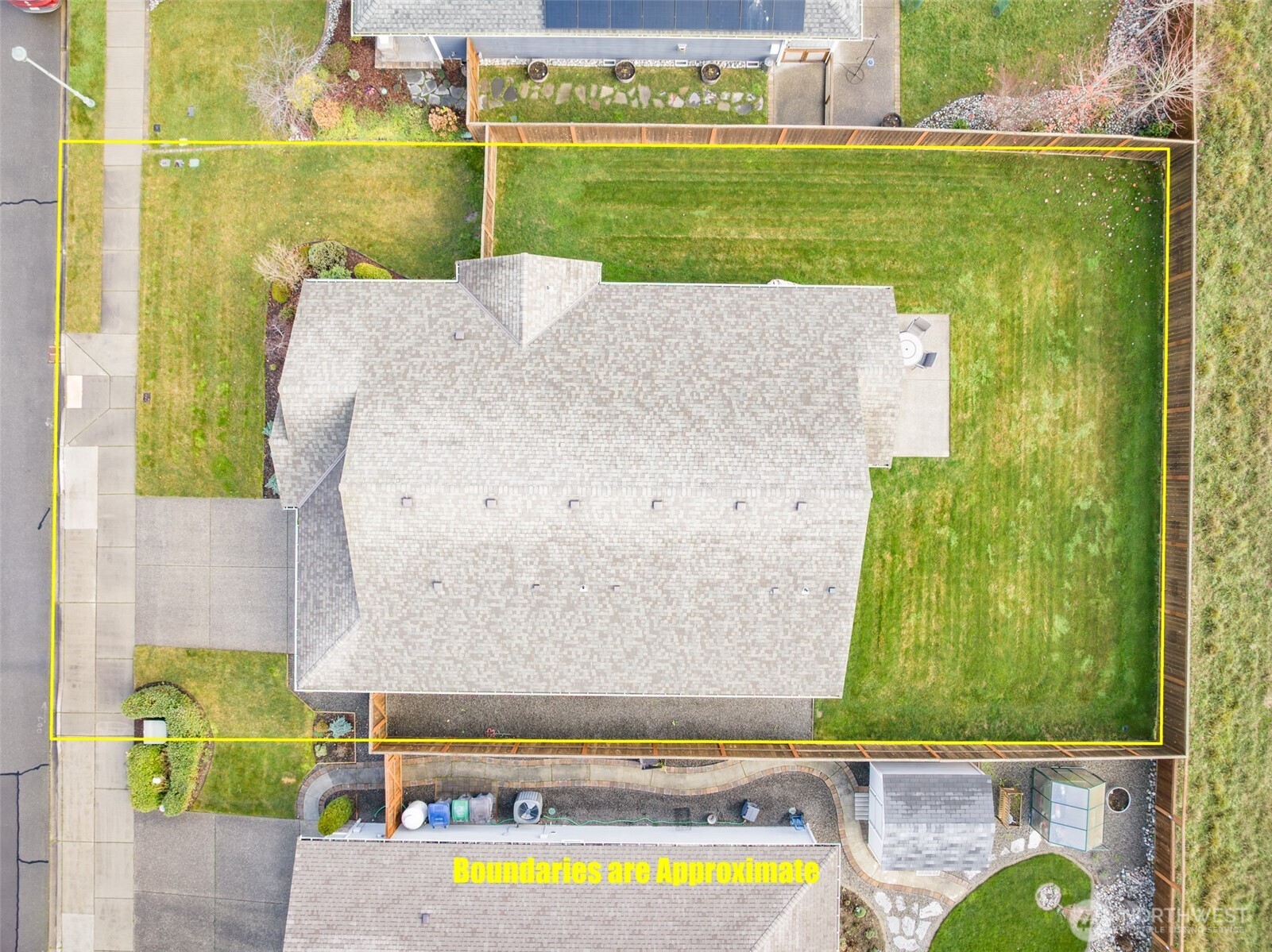 440 Blue Glacier Loop Sequim, WA 98382 - Photo 34 of 34 an aerial view of a house with a garden and swimming pool