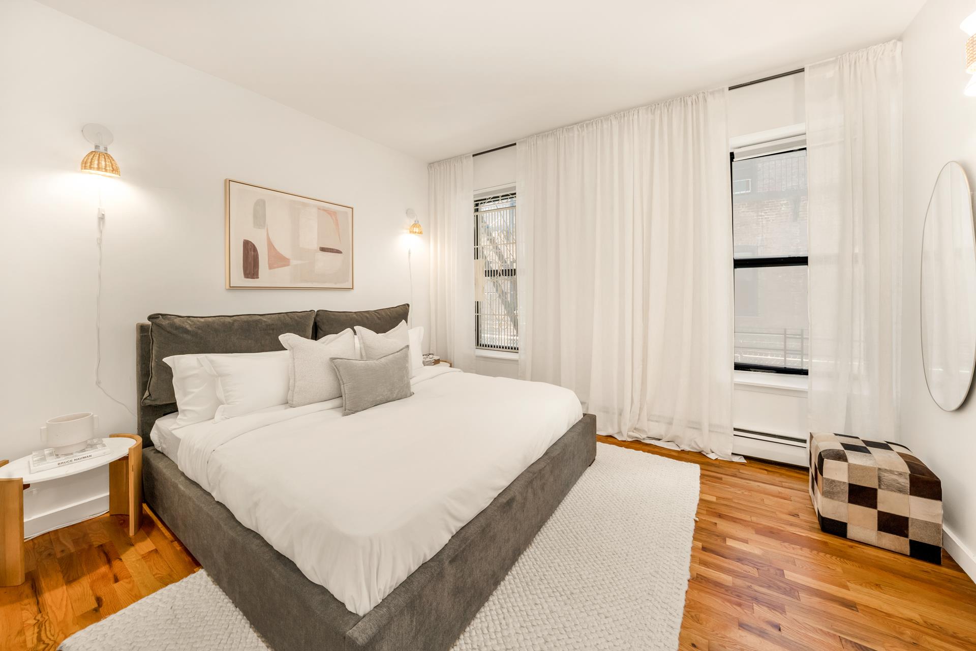 314 West 94th Street, Unit 2A Manhattan, NY 10025 - Photo 5 of 10 a bedroom with a bed and a window