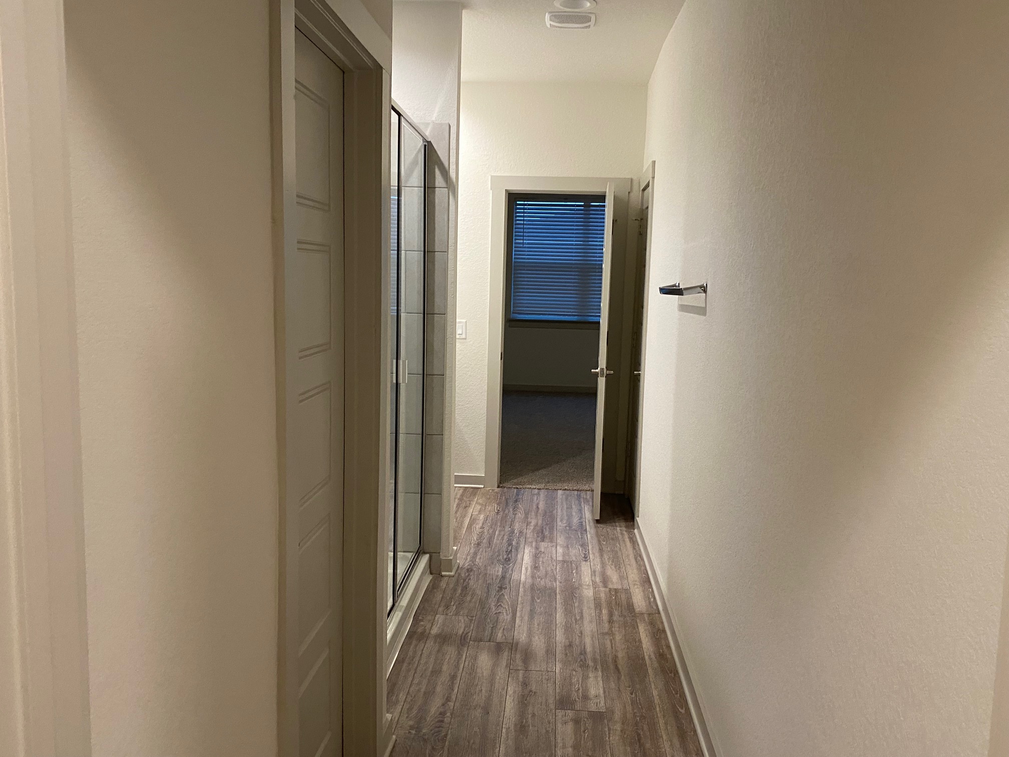 121 Parryi Cove Leander, TX 78641 - Photo 19 of 37 a view of a hallway with wooden floor