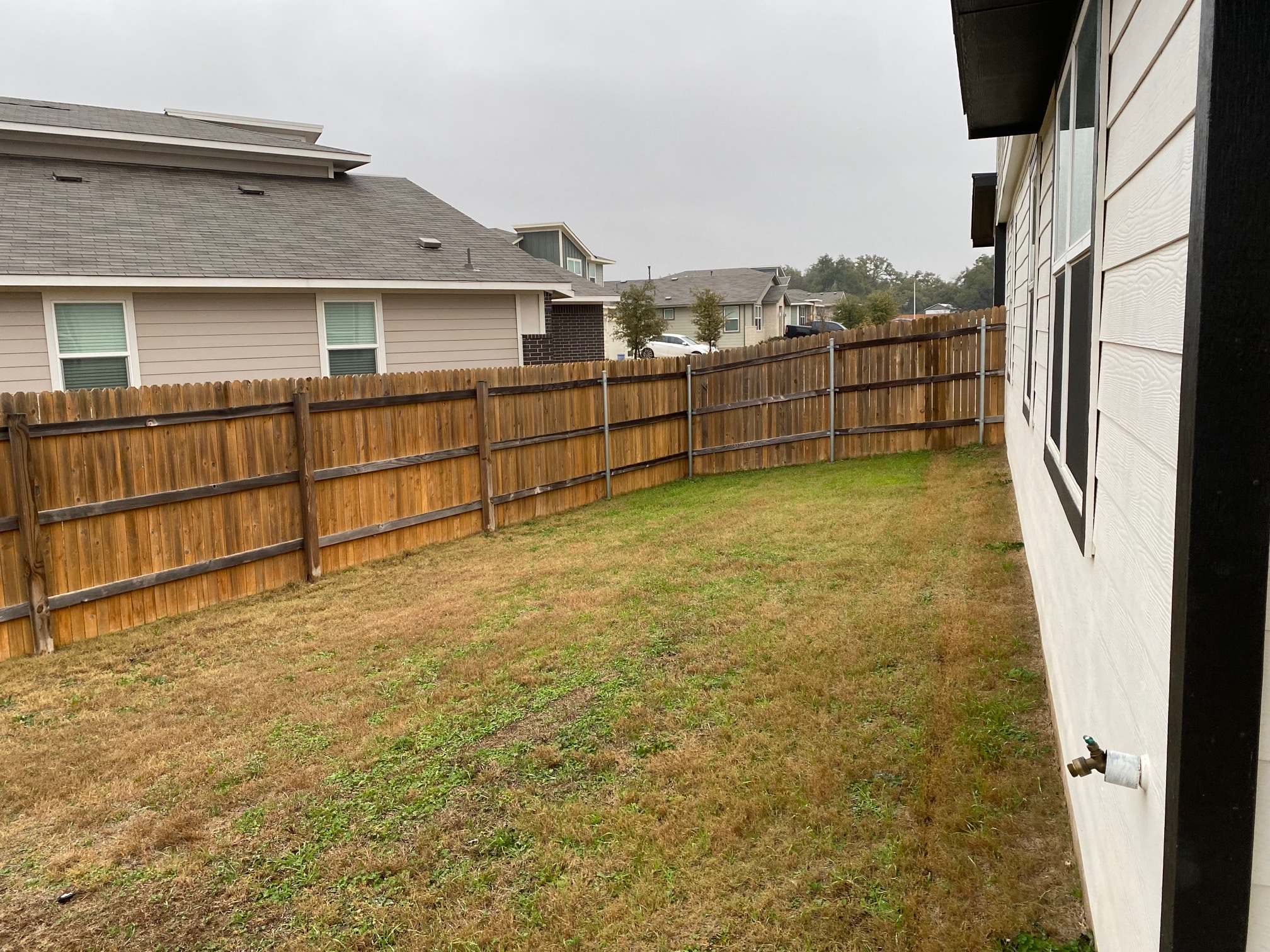 121 Parryi Cove Leander, TX 78641 - Photo 35 of 37 a view of a house with a backyard