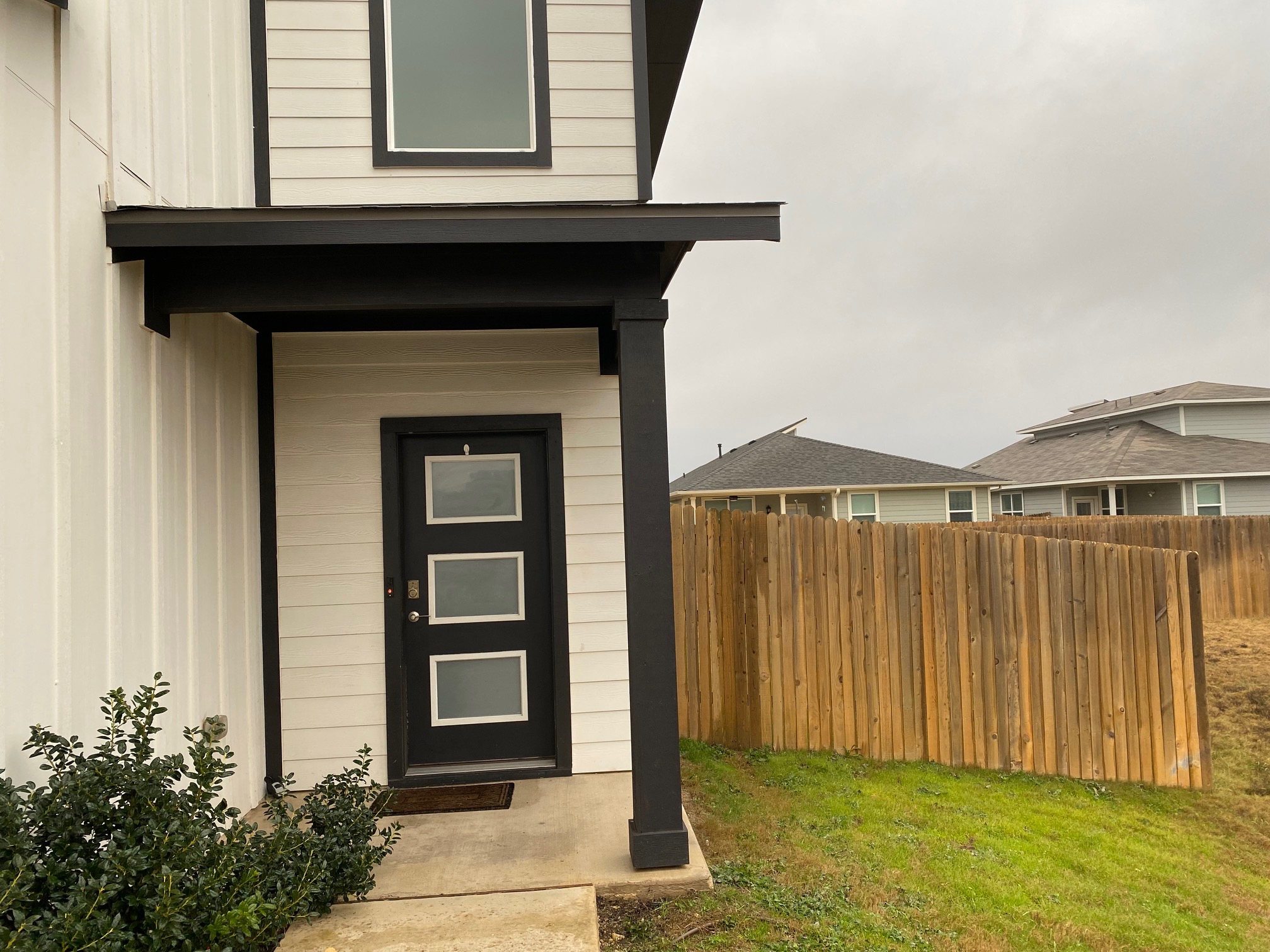 121 Parryi Cove Leander, TX 78641 - Photo 4 of 37 a front view of a house with a garden