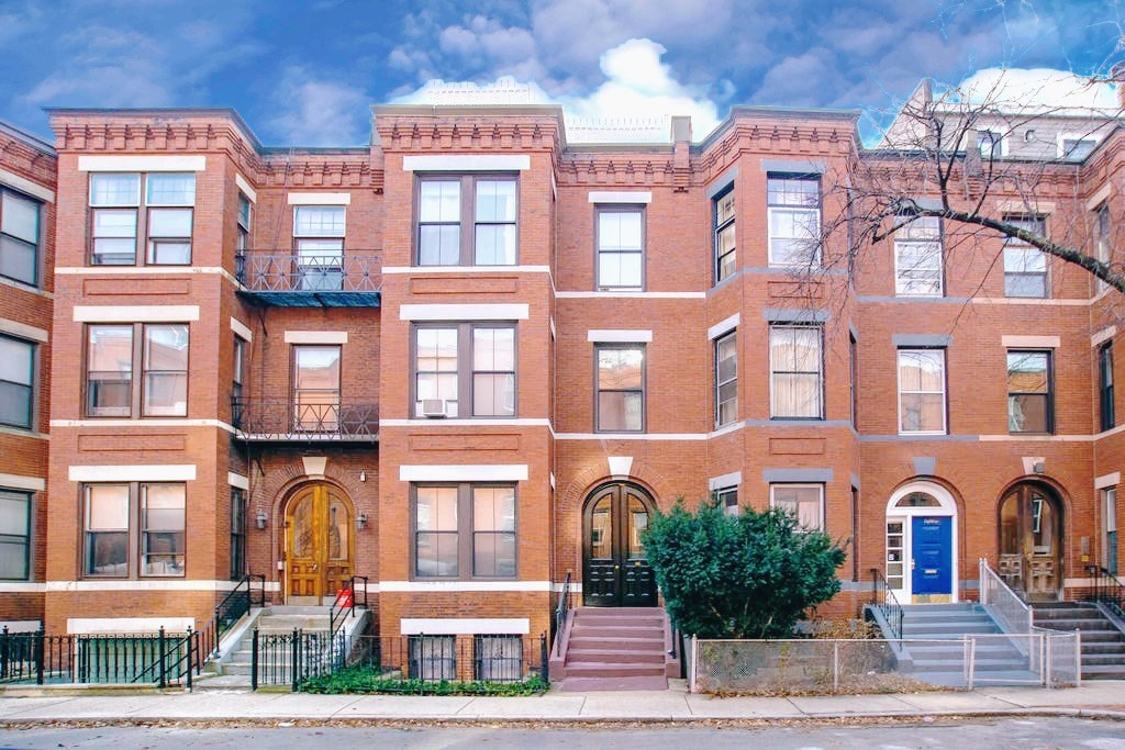a front view of a multi story residential apartment building