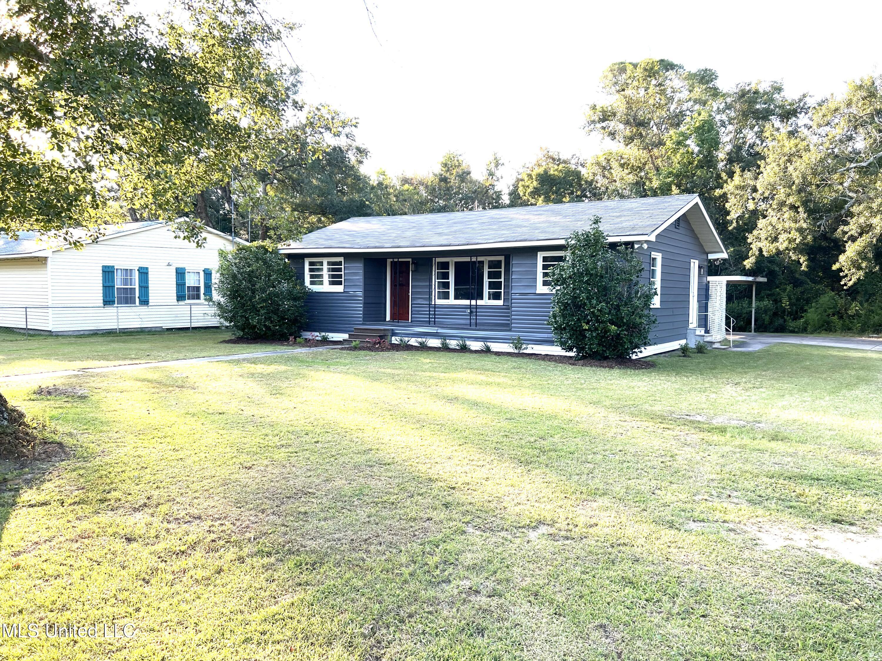 1159 East Old Pass Road Long Beach, MS 39560 - Photo 3 of 14 1159side