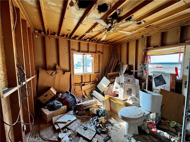 a room with furniture and a window