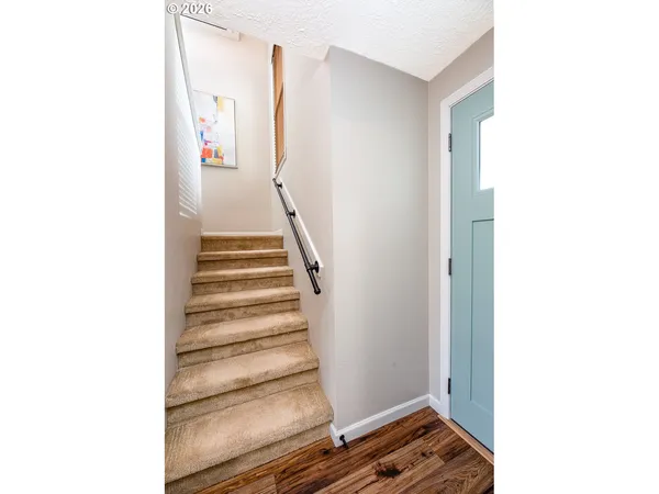 a view of an entryway with staircase