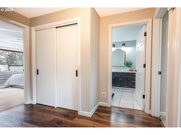 a view of a bathroom from a hallway